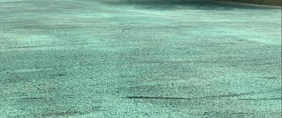 Blue-green slurry for hydroseeding in Boston, MA.