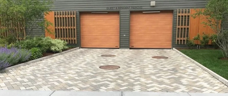 Driveway with two garage doors in Boston, MA.
