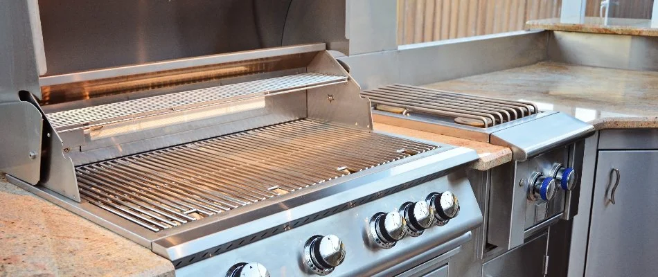 Grill and oven on an outdoor kitchen in Boston, MA.