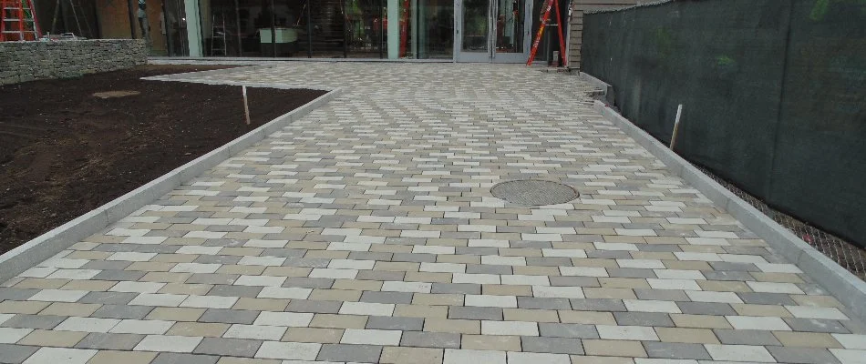 New paver walkway in front of a building in Brockton, MA.