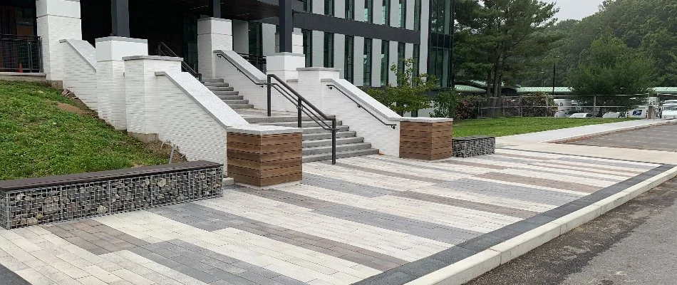 Paver walkway with steps leading up to a commercial building in Boston, MA.