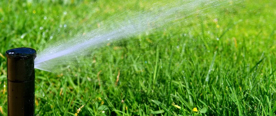 Sprinkler irrigation system on a lawn in Boston, MA.